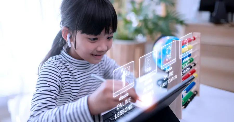 A young girl using a laptop with educational icons on the screen, smiling as she engages in an online lesson on the role of AI in education. 